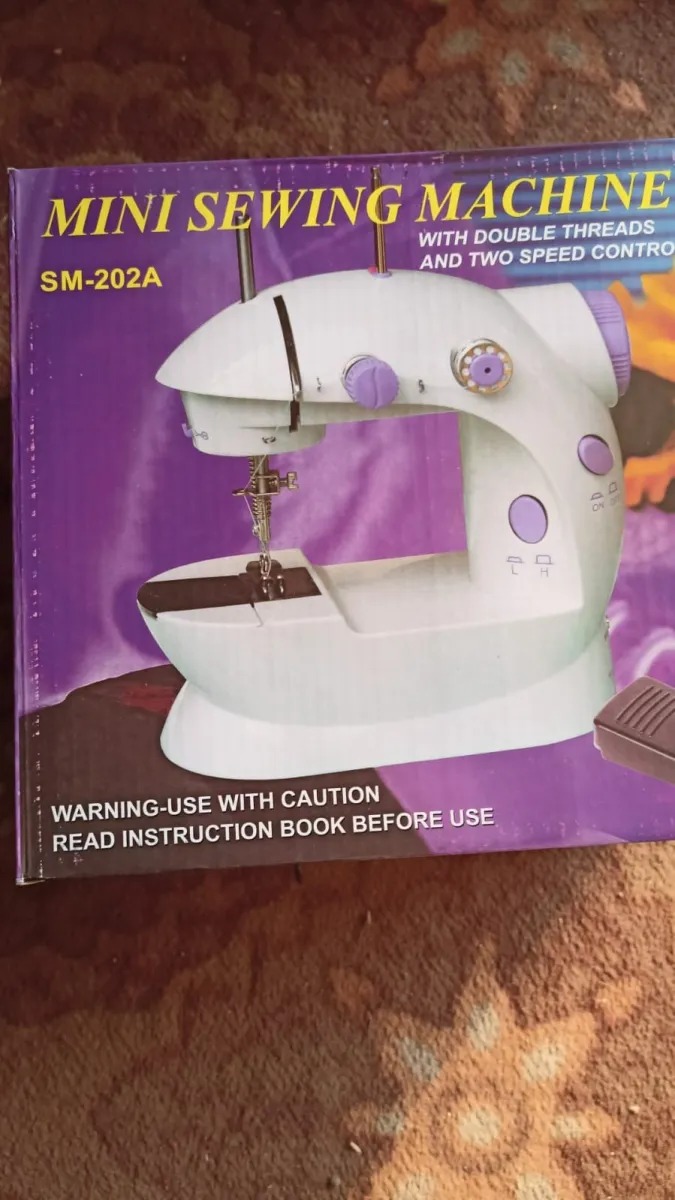SM-202A Electric Mini Sewing Machine – Double Threads & Two Speed Control for Home & Travel - Image 4