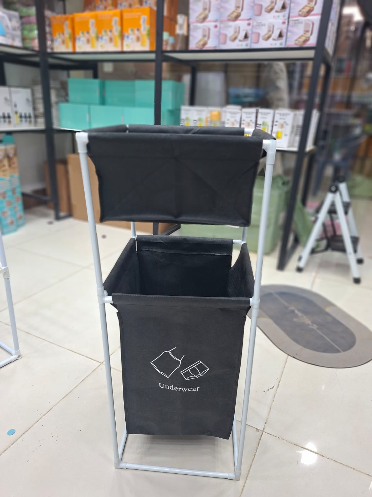 Fabric Laundry Hamper With Dual Compartments And White Metal Frame For Organized Clothing And Underwear Storage - Image 4